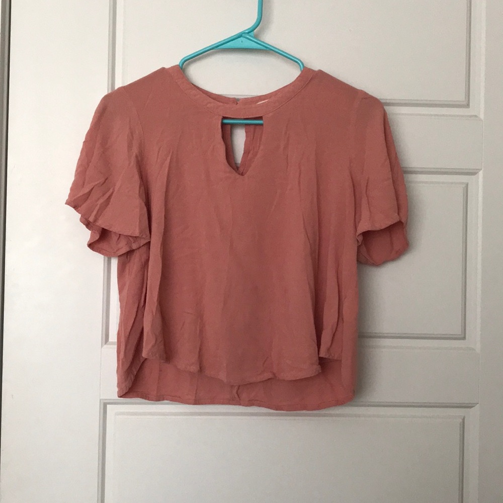 Pink top with v neck cut out